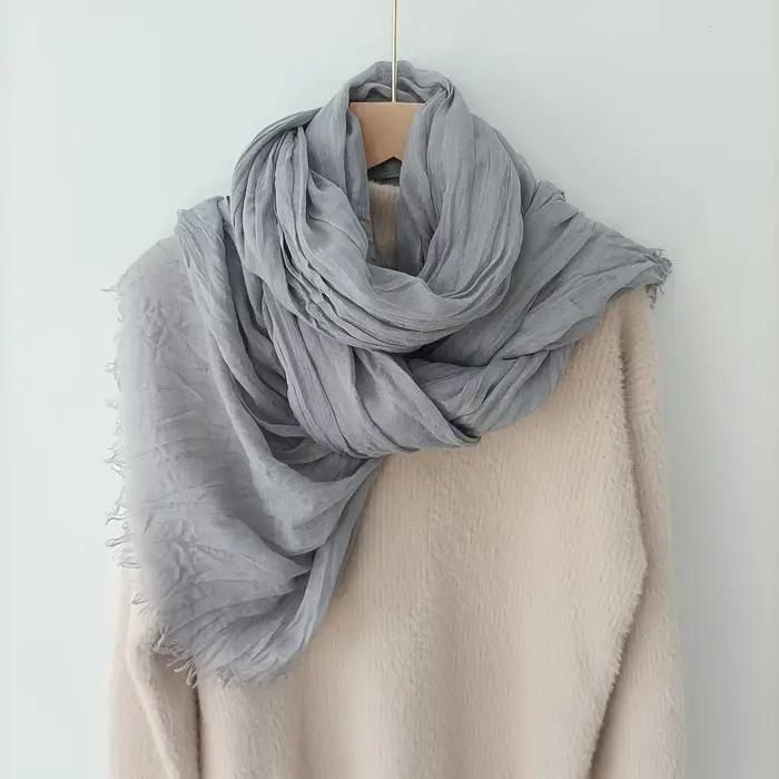 Écharpe pour femme en polyester tricoté avec texture littéraire plissée bord brut multifonctionnelle pour toutes les saisons occasions spéciales